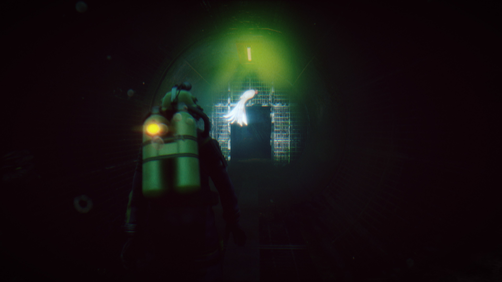 Buzo caminando sobre un túnel submarino. Delante de él hay un pulpo nadando.